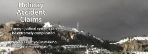 An image of a holiday resort on a hill with a gloomy sky in the background