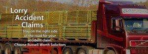 An image of a lorry laden with wood