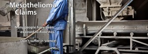 An image of a man in a blue work clothes working in a dirty factory