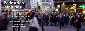 An image of a london pedestrian crossing by the shard with lots of people crossing