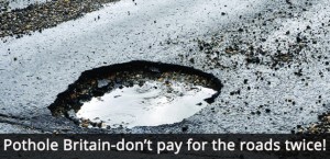 A close up image of a pothole in a road