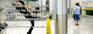 An image of a woman in a black suite slipping next to a 'caution wet floor sign' in what appears to be either a supermarket or airport